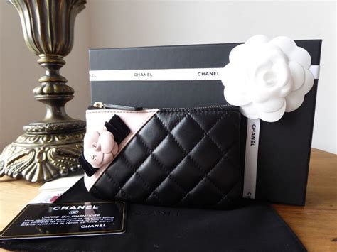 chanel small o case camelia|Chanel Clutches .